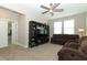 Spacious loft featuring comfortable seating, entertainment center, and neutral color scheme at 12272 Bracco St, Winter Garden, FL 34787