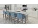 Bright kitchen showcasing a large center island with seating, modern stainless steel appliances, and stylish finishes at 12954 Promise Pl, Orlando, FL 32832