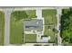 Overhead view of the property showing a neatly landscaped yard, patio, and solar panels on the roof at 1325 Mcneil Rd, Altamonte Springs, FL 32714