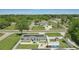 An aerial view featuring a charming property with solar panels, well-manicured lawns, and inviting backyard at 1325 Mcneil Rd, Altamonte Springs, FL 32714