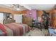 Large main bedroom with wood floors, plenty of closet space, and a dedicated workout area at 1325 Mcneil Rd, Altamonte Springs, FL 32714