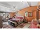 Spacious main bedroom with a vaulted ceiling, wood floors, and plenty of natural light at 1325 Mcneil Rd, Altamonte Springs, FL 32714