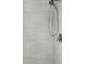 Modern shower featuring sleek, horizontally-laid tiles and a chrome shower head fixture at 1325 Mcneil Rd, Altamonte Springs, FL 32714