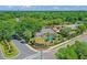 Beautiful aerial view of a home with a private pool and lush landscaping in a desirable neighborhood at 1440 Suzanne Way, Longwood, FL 32779