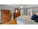 The main bedroom showcases hardwood floors, neutral paint, and ample closet space with natural lighting at 1440 Suzanne Way, Longwood, FL 32779