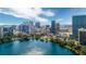 Panoramic aerial view of downtown area with a lake and modern buildings at 150 E Robinson St # 2807, Orlando, FL 32801