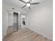 Bedroom features wood floors, closet, and access to the kitchen at 150 E Robinson St # 2807, Orlando, FL 32801