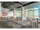 Spacious lounge area with high ceilings, floor-to-ceiling windows, and contemporary furnishings at 150 E Robinson St # 2807, Orlando, FL 32801