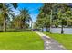 Serene park setting with a walkway leading to a lake at 150 E Robinson St # 2807, Orlando, FL 32801