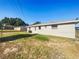Expansive backyard view featuring a well-maintained lawn at 1543 Sarah St, Lake Wales, FL 33898