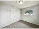 Cozy bedroom with neutral carpet and walls at 1543 Sarah St, Lake Wales, FL 33898