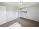 Bright and airy bedroom offers neutral carpeting, a closet and a large window at 1543 Sarah St, Lake Wales, FL 33898