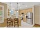 Bright kitchen offers stainless steel appliances, breakfast bar, and ample storage at 1570 Barking Deer Cv, Casselberry, FL 32707
