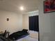 The bedroom features a simple design, perfect for relaxation and rest at 1596 Park Side Ave, Kissimmee, FL 34744