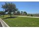 Beautiful Kindred community sign with manicured lawns and landscaping, showcasing curb appeal at 1596 Park Side Ave, Kissimmee, FL 34744