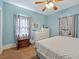 Bright bedroom with hardwood floors and natural light at 16 E Orange Street St, Davenport, FL 33837