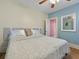 Bright bedroom with hardwood floors and neutral decor at 16 E Orange Street St, Davenport, FL 33837