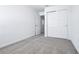Neat bedroom with carpet, a closet for storage, and a connecting door to another room at 16395 Bird Of Paradise Ave, Clermont, FL 34714