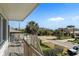 Relaxing deck with neighborhood views, offering a serene outdoor experience at 1640 N Atlantic Ave, New Smyrna Beach, FL 32169