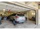 Spacious two-car garage with ample storage space and a parked vehicle inside at 1640 N Atlantic Ave, New Smyrna Beach, FL 32169