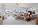 Bright living room with large windows providing natural light and scenic views at 1640 N Atlantic Ave, New Smyrna Beach, FL 32169