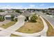 Front aerial shot of home showcasing the front yard, driveway, and landscaping at 17500 Butterfly Pea Ct, Clermont, FL 34714