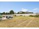 Large backyard with patio area perfect for outdoor entertaining and lounging at 17500 Butterfly Pea Ct, Clermont, FL 34714
