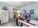 Comfortable home office with modern decor and a spacious desk and chair at 17500 Butterfly Pea Ct, Clermont, FL 34714