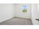 Neutral bedroom with a view outside the window at 1805 Archer Dr, Minneola, FL 34715