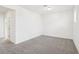 Bright bedroom features neutral carpet and fresh white walls at 1805 Archer Dr, Minneola, FL 34715