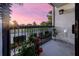 Balcony view showing colorful plants, clear furniture, and peaceful view at 200 Carolina Ave # 201, Winter Park, FL 32789