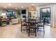 Stylish dining area showcasing modern furnishings, hardwood floors, and open floor plan at 200 Carolina Ave # 201, Winter Park, FL 32789