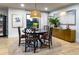 Elegant dining room featuring a round table, unique chairs, and eye-catching decor at 200 Carolina Ave # 201, Winter Park, FL 32789