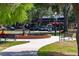Scenic park with a fountain, benches, and grassy areas, ideal for leisure and outdoor activities at 200 Carolina Ave # 201, Winter Park, FL 32789