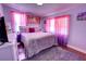 Inviting bedroom with decorative art, a plush rug, and comfortable, coordinated furnishings at 200 W 27Th St, Sanford, FL 32773