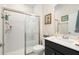 Bathroom with a glass-enclosed shower, toilet, and vanity at 2003 Spring Shower Cir, Kissimmee, FL 34744