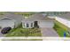Charming single Gathering home boasting manicured landscaping and neutral paint at 2003 Spring Shower Cir, Kissimmee, FL 34744