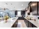 Spacious kitchen with expansive island, abundant counter space and modern appliances at 2003 Spring Shower Cir, Kissimmee, FL 34744