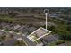 Wide aerial shot of a residential community with houses, trees, and a scenic view at 2655 Star Lake View Dr, Kissimmee, FL 34747