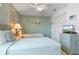 Bedroom featuring two twin beds, soft decor, and ample space at 2655 Star Lake View Dr, Kissimmee, FL 34747