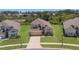 Lovely two-story home on a large lot with lush green grass and an attached garage at 2655 Star Lake View Dr, Kissimmee, FL 34747