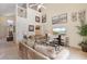 Bright and airy living room with comfortable seating, high ceiling, and view of the upper floor at 2655 Star Lake View Dr, Kissimmee, FL 34747