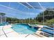 Covered pool and lounge area perfect for enjoying the outdoors at 2655 Star Lake View Dr, Kissimmee, FL 34747
