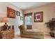 Bright seating area features wall art and neutral tones with natural light at 2655 Star Lake View Dr, Kissimmee, FL 34747