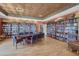 Community library featuring a large collection of books and cozy reading spaces for residents at 26807 Bull Run, Leesburg, FL 34748