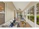 Inviting sunroom filled with natural light, a comfortable seating area, and peaceful outdoor views at 26807 Bull Run, Leesburg, FL 34748