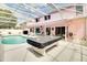 Enclosed backyard pool with an adjacent covered patio provides ample entertainment space at 2712 Rolling Broak Dr, Orlando, FL 32837