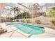 Enclosed pool area featuring an inviting pool and outdoor lounge space at 2712 Rolling Broak Dr, Orlando, FL 32837