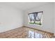 Bedroom featuring patterned tile floors and a sunny window with curtains at 3345 Reedy Glen Dr, Kissimmee, FL 34758