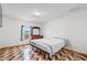 Bedroom with a dresser and bed near a window that provides natural light at 3345 Reedy Glen Dr, Kissimmee, FL 34758